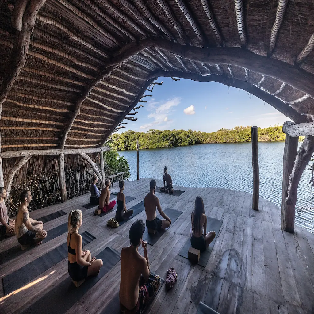 A restorative yoga retreat setting in nature.